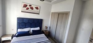 Voodi või voodid majutusasutuse Super appartement vue sur mer et à 2 minutes de la plage de Martil. toas