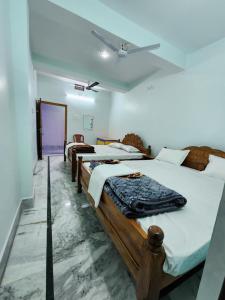 Ένα ή περισσότερα κρεβάτια σε δωμάτιο στο Bamni Tourist Lodge