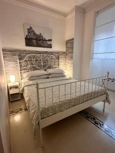 - une chambre avec un lit dans l'établissement Mio House Vatican, à Rome