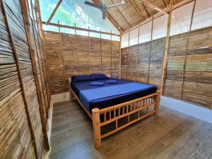 Postel nebo postele na pokoji v ubytování SunBoo Beach Bungalows