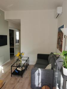 Et tv og/eller underholdning på Casarino House Luxury Apartment