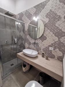 Et badeværelse på Casarino House Luxury Apartment