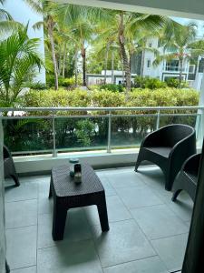 Een balkon of terras bij Apartment with garden, Beautiful place on Estrella Dominicus-Bayahibe