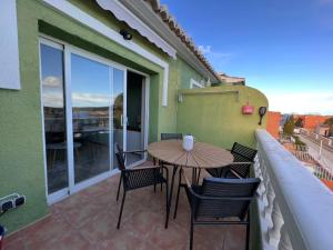 Een balkon of terras bij Casa Verde