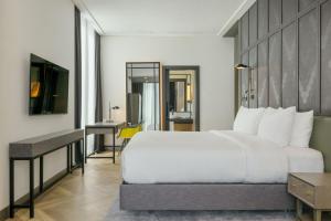 TV a/nebo společenská místnost v ubytování Four Points by Sheraton Budapest Danube