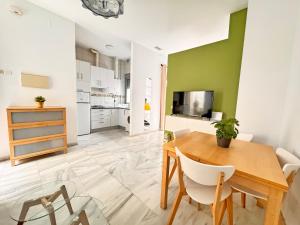 Kuchyňa alebo kuchynka v ubytovaní TRIANA EXCLUSIVE con terraza privada