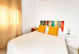 Posteľ alebo postele v izbe v ubytovaní TRIANA EXCLUSIVE con terraza privada