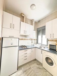 Kuchyňa alebo kuchynka v ubytovaní TRIANA EXCLUSIVE con terraza privada