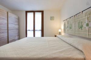 Postel nebo postele na pokoji v ubytování B&B Sa Serra