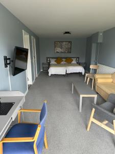 Postel nebo postele na pokoji v ubytování Lynge kro & Hotel