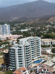 an aerial view of a city with tall buildings at El Rodadero Sur SANTA MARTA in Puerto de Gaira