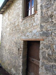 Facaden eller indgangen til Tuscany Escape
