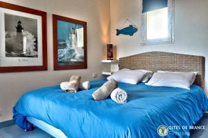 Кровать или кровати в номере LocaLise - B80 - La villa Blanche - L'iroise - 1er étage plain pied - Wifi inclus - Draps inclus - Animaux bienvenues