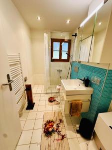 a bathroom with a sink and a mirror at Chalet Swiss Alpine Haven in Iseltwald +36 photos