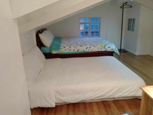 Säng eller sängar i ett rum på The White Pine at No 7 Pucay Village
