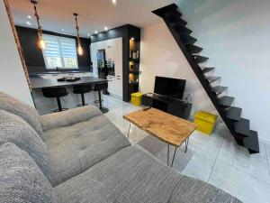 Posezení v ubytování Duplex cosy Nancy à 10 minutes