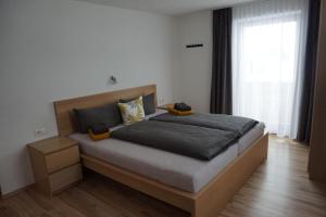 Posteľ alebo postele v izbe v ubytovaní Ferienhaus Melmer Florian