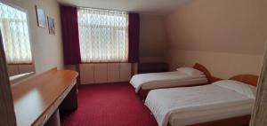 Postel nebo postele na pokoji v ubytování Motel Monza