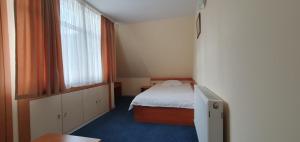 Postel nebo postele na pokoji v ubytování Motel Monza