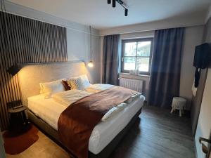 Katil atau katil-katil dalam bilik di Appartement Wimreiter