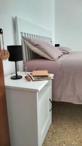 Postel nebo postele na pokoji v ubytování Agriturismo Le Crede 1930