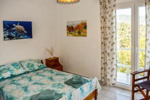 Кровать или кровати в номере Nest View House