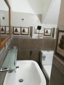 Vonios kambarys apgyvendinimo įstaigoje Dinu Homestay