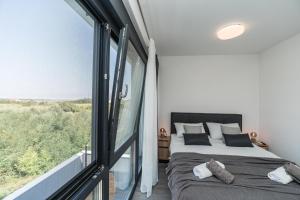 Ένα ή περισσότερα κρεβάτια σε δωμάτιο στο Villa Valy with heated pool +46 φωτογραφίες