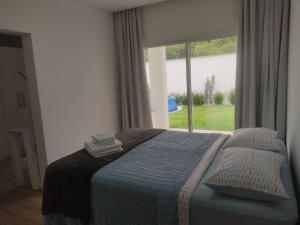 Postel nebo postele na pokoji v ubytování Casa na prai Balneario Camboriu + 41 fotografií