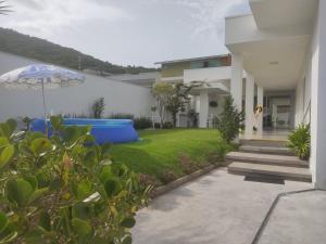 Zahrada ubytování Casa na prai Balneario Camboriu