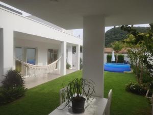 Bazén v ubytování Casa na prai Balneario Camboriu nebo v jeho okolí