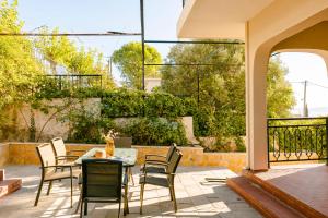 Балкон или терраса в Κefalonia Ηolidays Ηouse