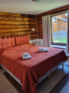 Giường trong phòng chung tại Cabañas La Señalada +67 ảnh