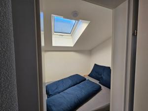 Un pat sau paturi într-o cameră la Apartment Elise