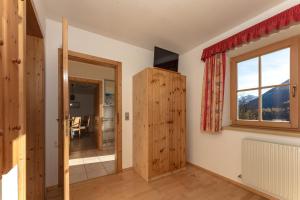 A television and/or entertainment centre at Haus Diamant by Schladming-Appartements
