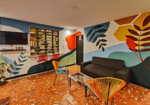 Televisyen dan/atau pusat hiburan di Zamia Hostel