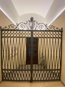 a gate in the hallway of a house at B&B La Piazzetta della Pioggia in Bologna