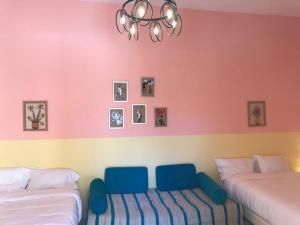 Ένα ή περισσότερα κρεβάτια σε δωμάτιο στο Dar Medina Tozeur