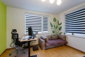 A seating area at DevIn Coworking & Coliving