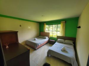 Katil atau katil-katil dalam bilik di Casa de campo