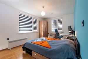 A bed or beds in a room at DevIn Coworking & Coliving