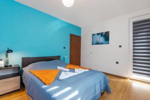 A bed or beds in a room at DevIn Coworking & Coliving