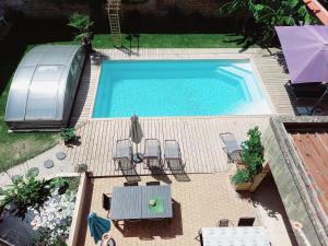 Fotografia z galérie ubytovania Appartement 3 ème étage avec piscine partagée v destinácii Sedan