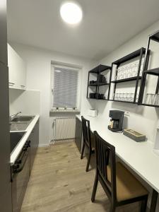 Kuhinja oz. manjša kuhinja v nastanitvi Luxury Apartment Ottweiler