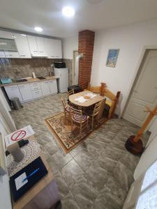 Kuchyň nebo kuchyňský kout v ubytování Apartman Tupavica + 9 fotografií