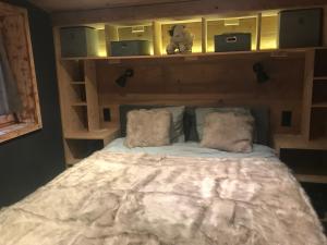 Un pat sau paturi într-o cameră la Appartement Alema