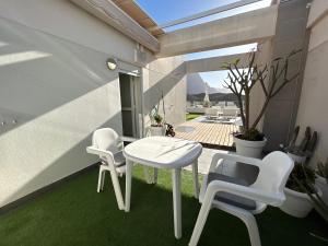 A balcony or terrace at The New Suite Agaete & Parking