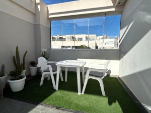 A patio or other outdoor area at The New Suite Agaete & Parking