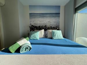 A bed or beds in a room at The New Suite Agaete & Parking