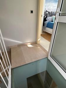 A bed or beds in a room at The New Suite Agaete & Parking